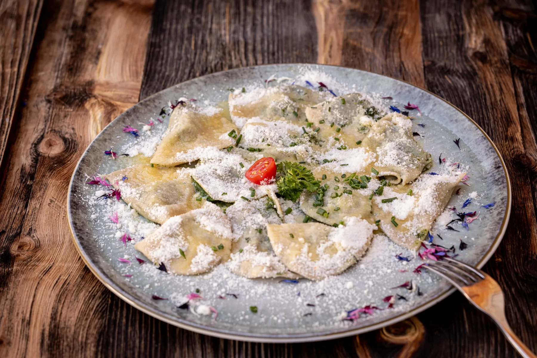 Schlutzkrapfen con parmigiano e burro fuso